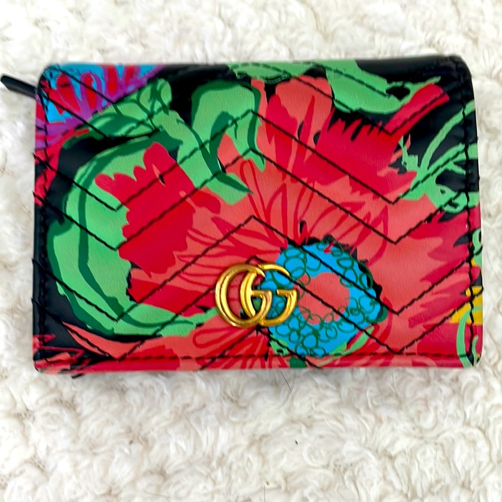 Authentic Gucci wallet. Excellent condition. Just not my style. It was a gift